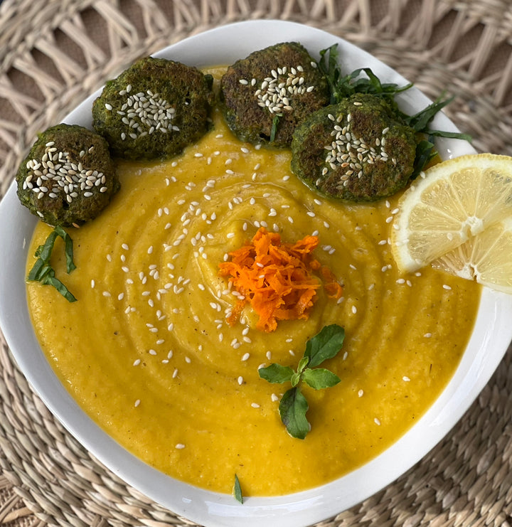 Squash Carrots Turmeric Soup with Spinach Millet Splatter